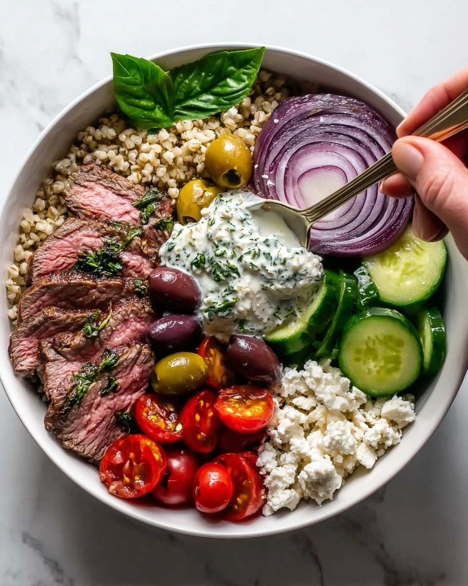 A white bowl filled with five main sections starting from the bottom left with a layer of cooked grains in light brown color, followed by slices of pink and charred meat arranged neatly on top. Next to the meat are thin round slices of deep purple onion rings, and bright green basil leaves placed for garnish. Moving clockwise, there are glossy light green and dark purple olives mixed with whole red cherry tomatoes. Adjacent to the olives is a dollop of white creamy sauce with green herbs on top, where a woman's hand is holding a spoon scooping some sauce. The last section has fresh green cucumber slices with white feta cheese crumbles scattered underneath. The bowl sits on a white marbled surface. photo taken with an iphone --ar 4:5 --v 7