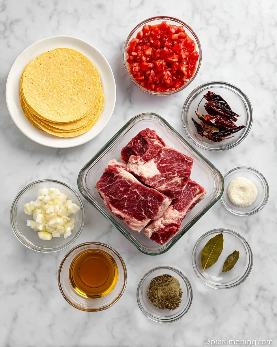 The image shows several cooking ingredients on a white marbled surface. There is a clear glass container in the center holding three thick pieces of raw red meat with white fat streaks. Around it, there are multiple small clear glass bowls: one with bright red diced tomatoes, one with white chopped onions, one with three dark dried peppers, one with three peeled garlic cloves, one with a mix of spices including a bay leaf, one with fresh green herbs, and one with clear liquid possibly oil and another with a light brown liquid. A small stack of yellow corn tortillas is placed on a white plate to the left. All items are arranged neatly and evenly spaced. Photo taken with an iphone --ar 4:5 --v 7