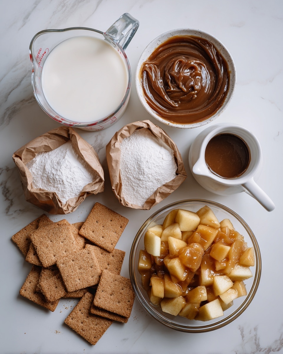The image shows the ingredients to make a dessert laid out on a white marbled surface. Starting from the top left, there is a clear glass measuring cup filled almost to the top with white milk. To its right, there is a small white pitcher filled with shiny, dark brown caramel sundae topping. Below the measuring cup, there are two small brown paper bags, each filled with white, powdery vanilla instant pudding mix. A pile of light brown graham crackers is arranged at the bottom left, some whole and some broken into smaller pieces. On the bottom right, there is a clear glass bowl filled with glossy, chunky apple pie filling with soft pale yellow apple slices visible. photo taken with an iphone --ar 4:5 --v 7