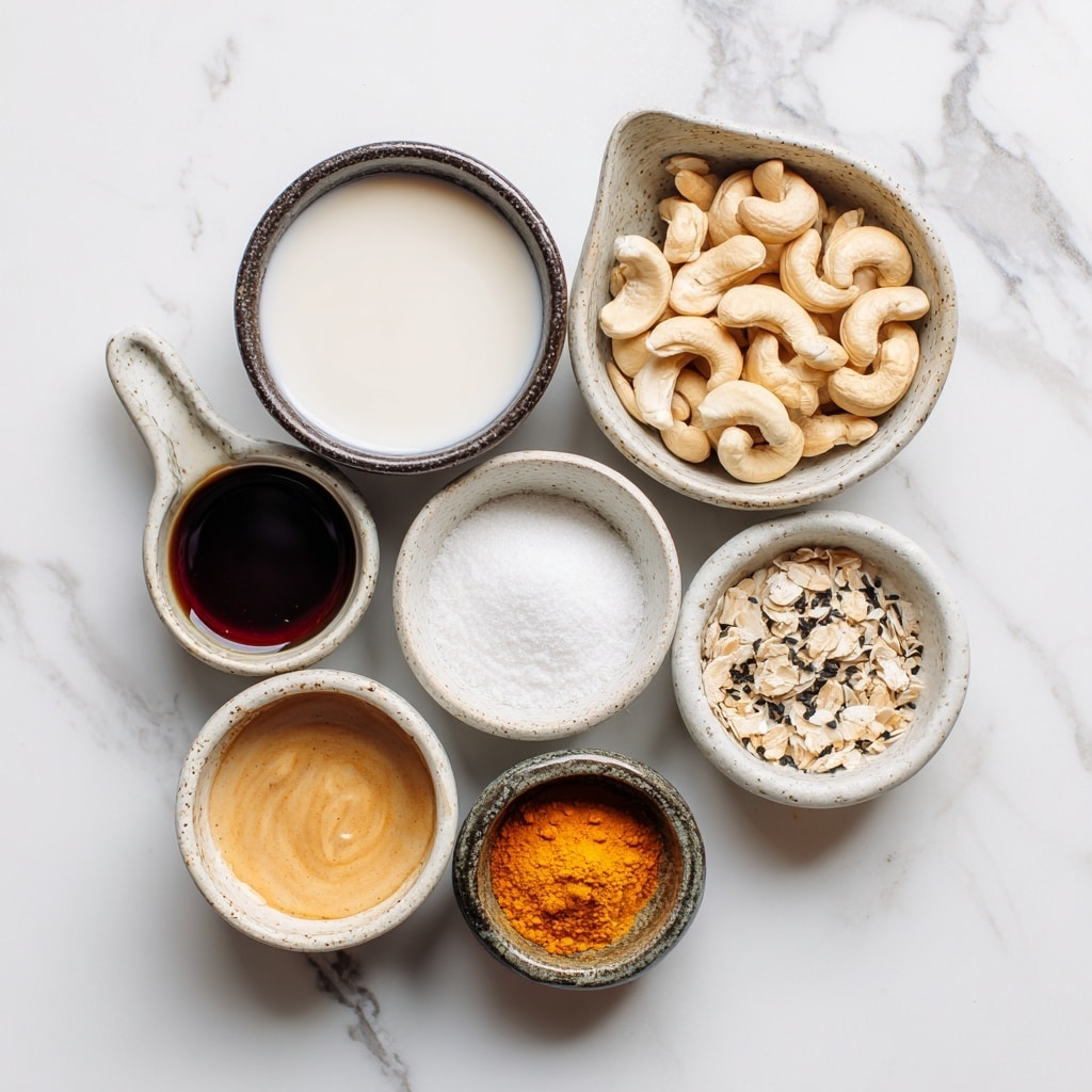 The image shows a close-up of two layered pastry pieces on a black plate, placed on a white marbled surface sprinkled with powdered sugar. Each pastry has three layers: the top and bottom layers are golden, flaky, and thin with a light puffed texture, and the middle layer is thick, creamy, and pale yellow, spilling slightly from the sides. Powdered sugar dusts the top pastry layer, adding a soft white contrast. In the background, four more pastries are arranged in a single row on a white rectangular plate, slightly out of focus but showing the same flaky texture and cream filling. Photo taken with an iphone --ar 4:5 --v 7