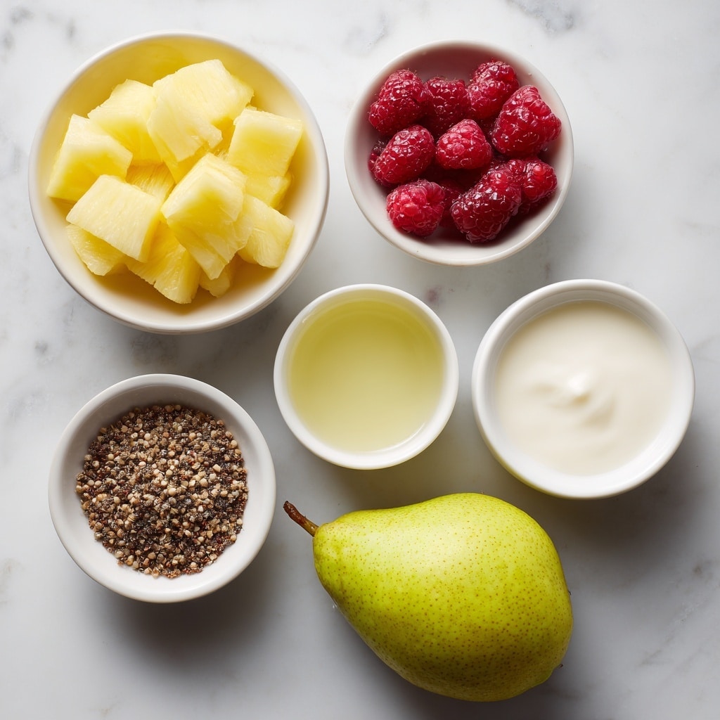 The image shows five small white bowls arranged in a loose circle on a white marbled surface. The top left bowl contains pale yellow pineapple pieces, bright and juicy in look. The top right bowl holds a few dark red raspberries with a slightly rough texture. Below the pineapple is a bowl filled with a clear pale yellow liquid labeled lemon juice. Next to it, to the right, is a bowl with white milk. At the bottom left is a small bowl with tiny brown celery seeds scattered inside. To the right of this setup, on the surface, is a whole yellow-green pear. The photo taken with an iphone --ar 4:5 --v 7