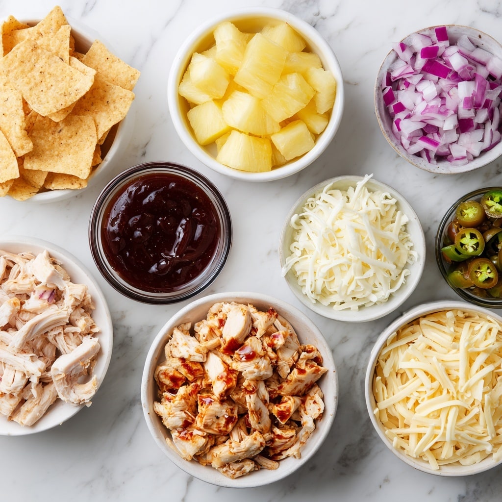 The dish shows a close-up of a layer of crispy yellow corn chips spread over a white tray. On top, there are pieces of grilled yellow pineapple with brown char marks, and small chunks of reddish cooked chicken. Sliced green jalapeño peppers and thin strips of purple onion are scattered over the dish. Melted white cheese drips over the layers, adding a creamy texture. Small bits of fresh green cilantro are sprinkled on top, adding a lively touch. The background is a white marbled surface. photo taken with an iphone --ar 4:5 --v 7