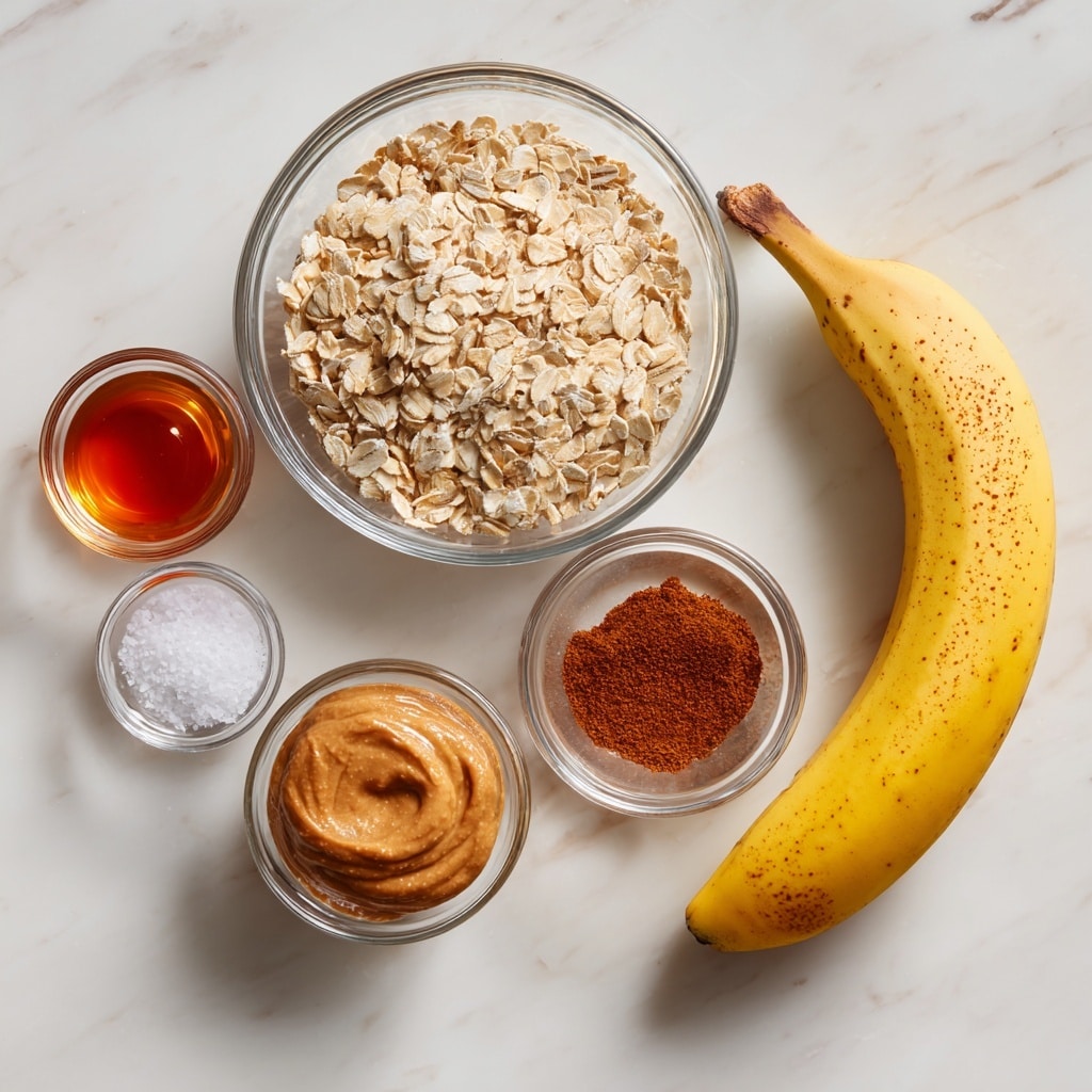 A white bowl on a white marbled surface filled with light brown granola clusters mixed with dark dried berries and light blue blueberries, soaked in white milk that partially covers them. On the left side of the bowl, there are five slices of pale yellow banana neatly placed in a row on top of the granola. A gold spoon is resting inside the bowl on the right side. Above the bowl, a whole yellow banana is placed horizontally with some loose oats scattered nearby. The scene is bright and minimal. Photo taken with an iphone --ar 4:5 --v 7