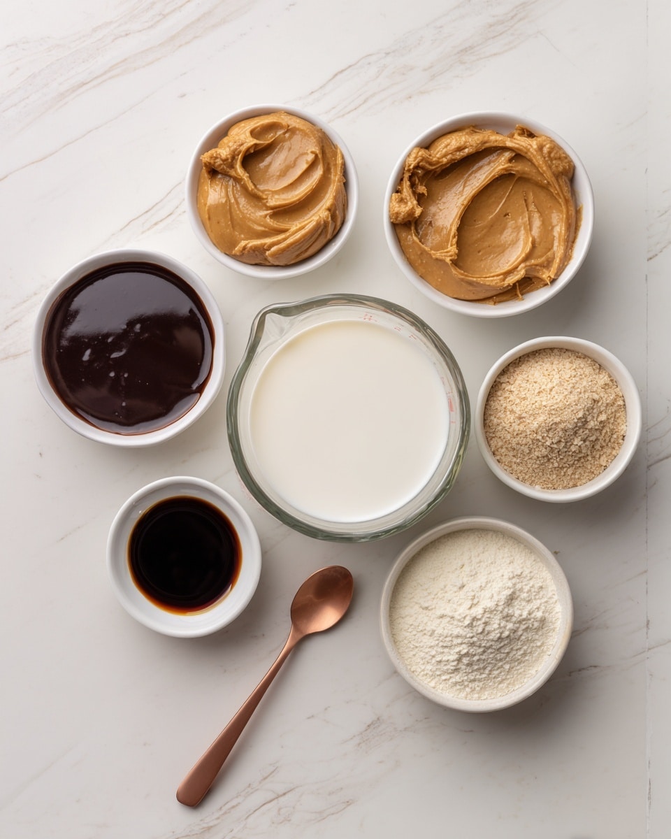 The image shows six small white bowls and one clear measuring cup arranged on a light wooden surface with a white marbled texture. The center features a clear measuring cup filled with white oat milk. Surrounding it are six white bowls; top center has light brown creamy peanut butter with a smooth texture, to the left is dark brown thick chocolate syrup, below that is dark amber maple syrup, bottom right holds a light beige powder labeled as protein powder, top right contains white oat milk for milkshake, and at the bottom center is a small copper spoon filled with dark brown vanilla extract. The whole setup is neat and bright with natural light, photo taken with an iphone --ar 4:5 --v 7