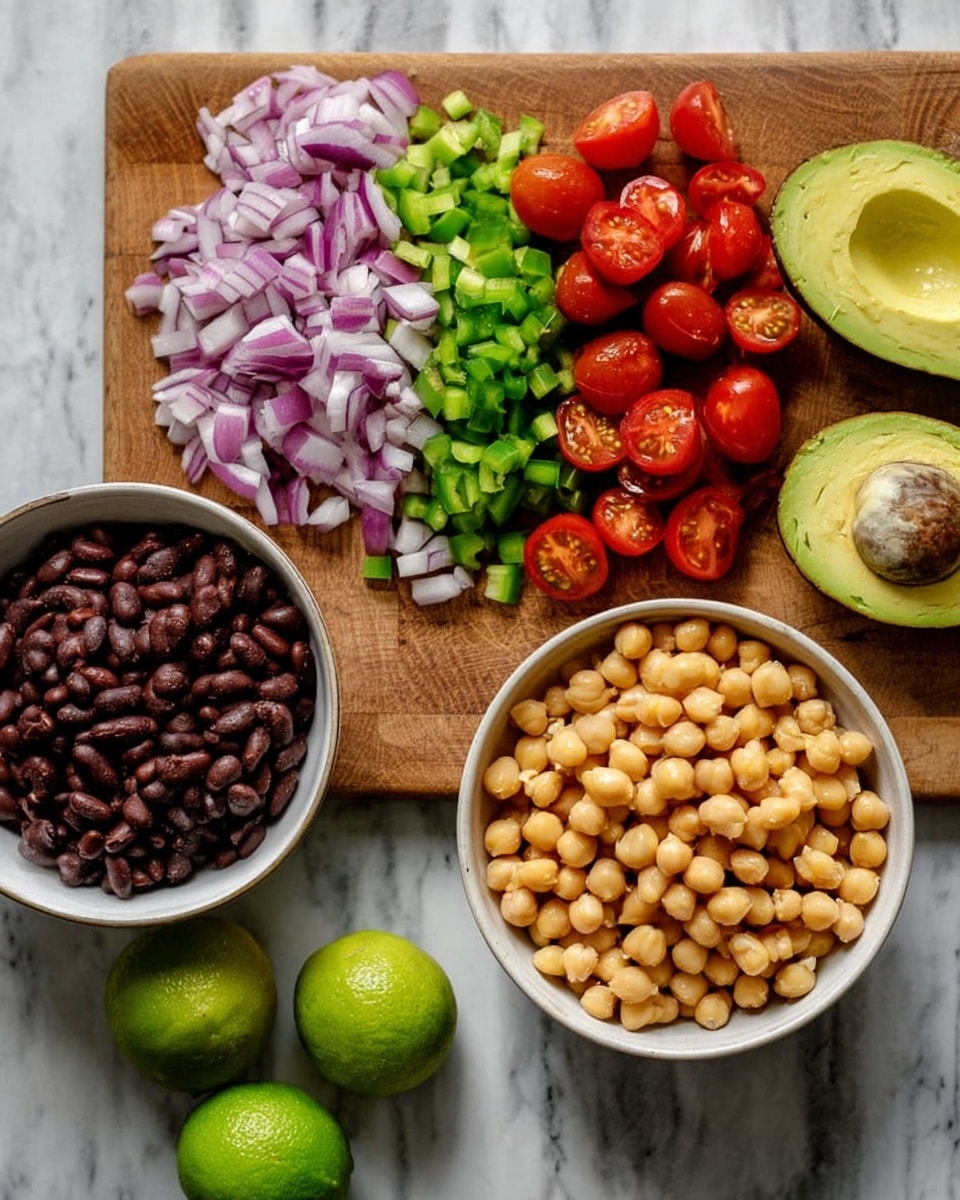 The image shows a wooden cutting board on a white marbled surface with four rows of chopped vegetables: purple onion, green chili, and red cherry tomatoes, arranged from left to right. Two halves of an avocado with a smooth green inside are placed at the top right corner of the cutting board. Below the cutting board, there is a white bowl filled with round beige chickpeas, and to the top left, there is another white bowl filled with dark brown beans. Two green limes are placed on the white marbled surface between the bowls. The colors are fresh and bright, with the natural textures of the vegetables visible. Photo taken with an iphone --ar 4:5 --v 7