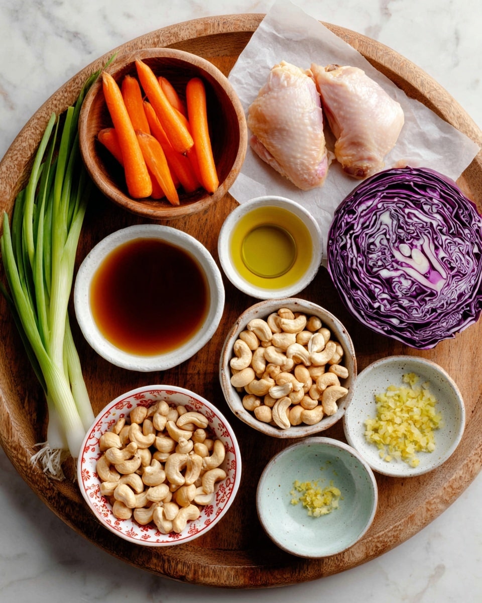 A round wooden board with various ingredient bowls and items arranged on a white marbled surface. Two raw chicken pieces lie on white parchment paper at the top center. To the left, a wooden bowl filled with thin orange carrot sticks sits near three bright green scallions lying diagonally. Next to the carrots, a small white bowl holds a dark amber liquid of sesame oil. In the middle bottom, a white bowl with a red pattern contains light beige chickpeas. Above it is a purple half of cabbage showing its detailed veining. To the right, a rustic white bowl holds an abundant pile of light brown cashew nuts. Small white bowls with a light blue inside contain white honey and a clear vinegar liquid, placed near the center and right side. A tiny white bowl with yellow chopped ginger is near the chickpeas. Each ingredient is clearly separated, showing raw and fresh textures. Photo taken with an iphone --ar 4:5 --v 7